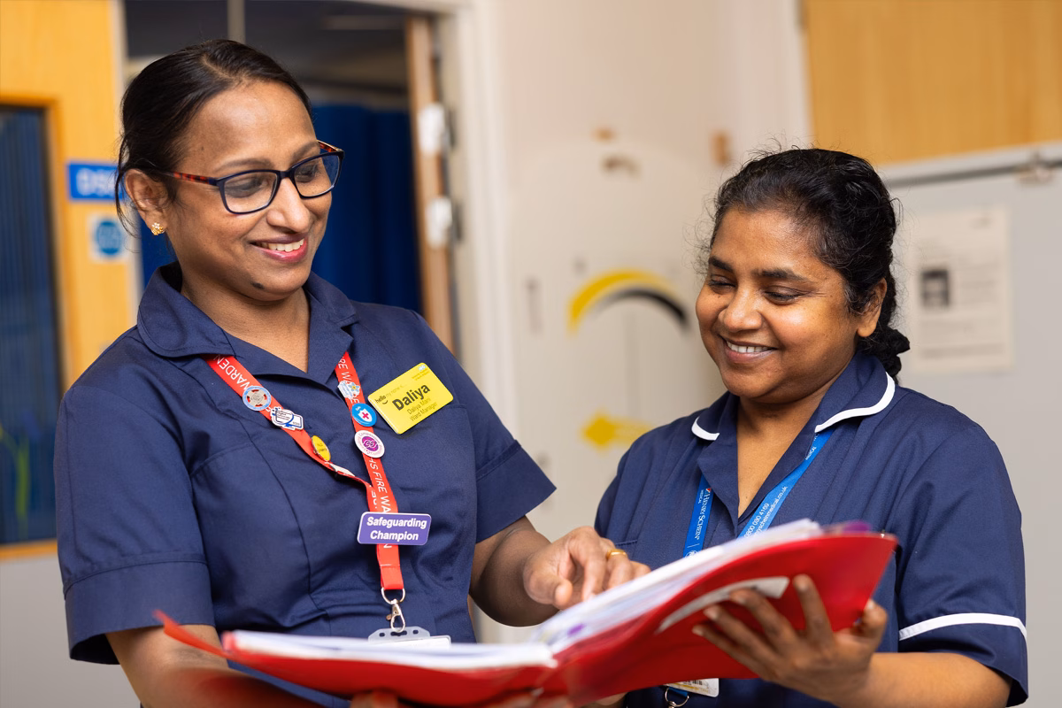 2 ward nurses smiling